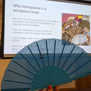 fan in front of menopause in the workplace slide