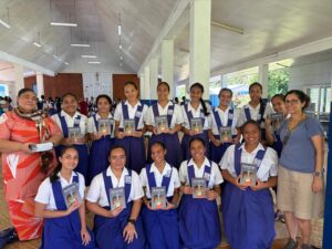 Samoan students holding The Bottle Imp