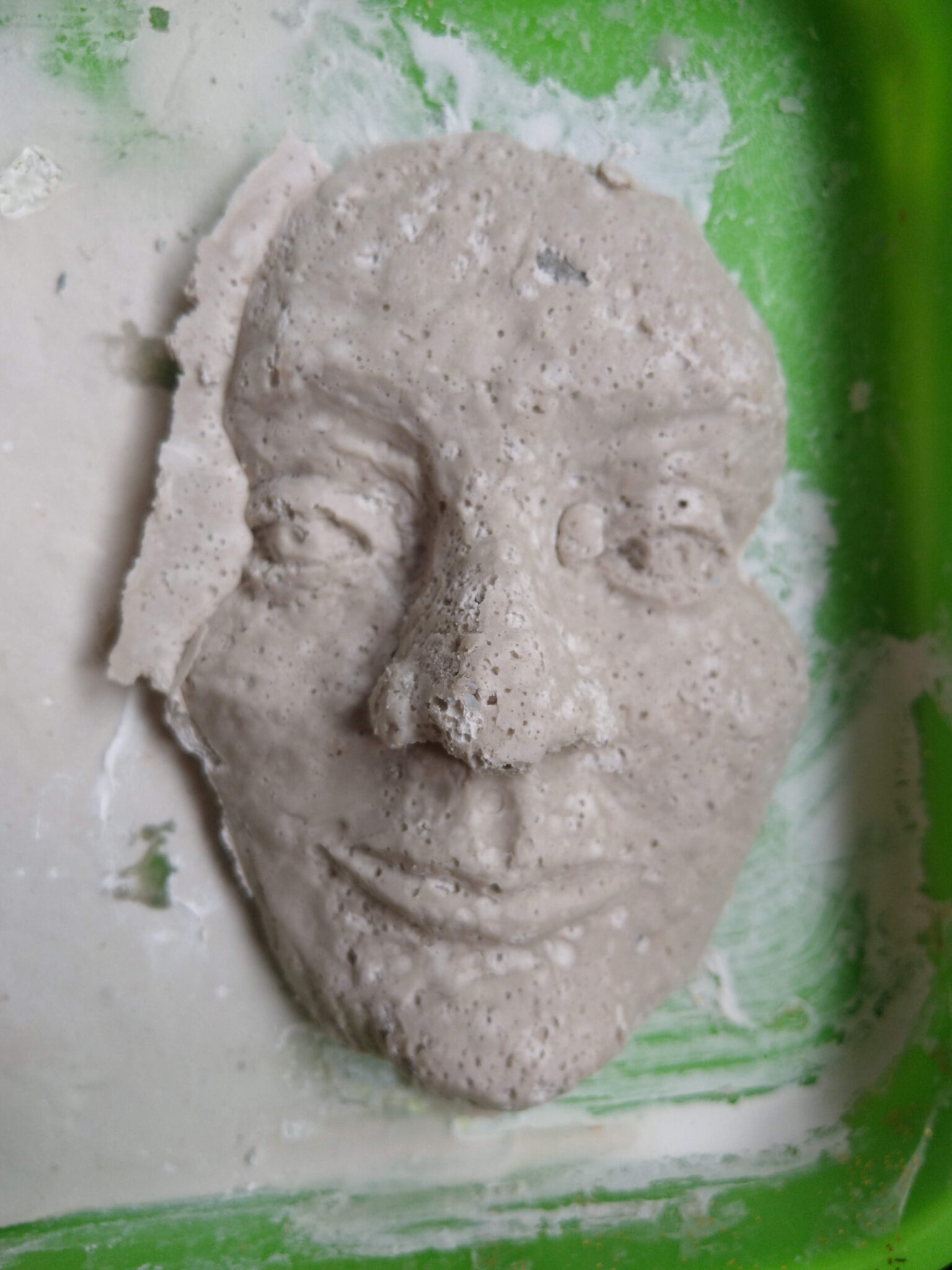 Plaster faces made from a wax original and silicon mold Isabella