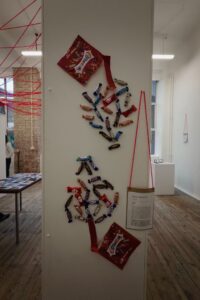 Celebrations chocolates arranged in tree-like forms on a pillar.
