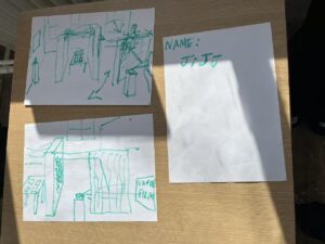 Hand-drawn exhibition plans, layout sketches, and planning notes made by Ji Ju Collective during a group discussion at Summerhall.