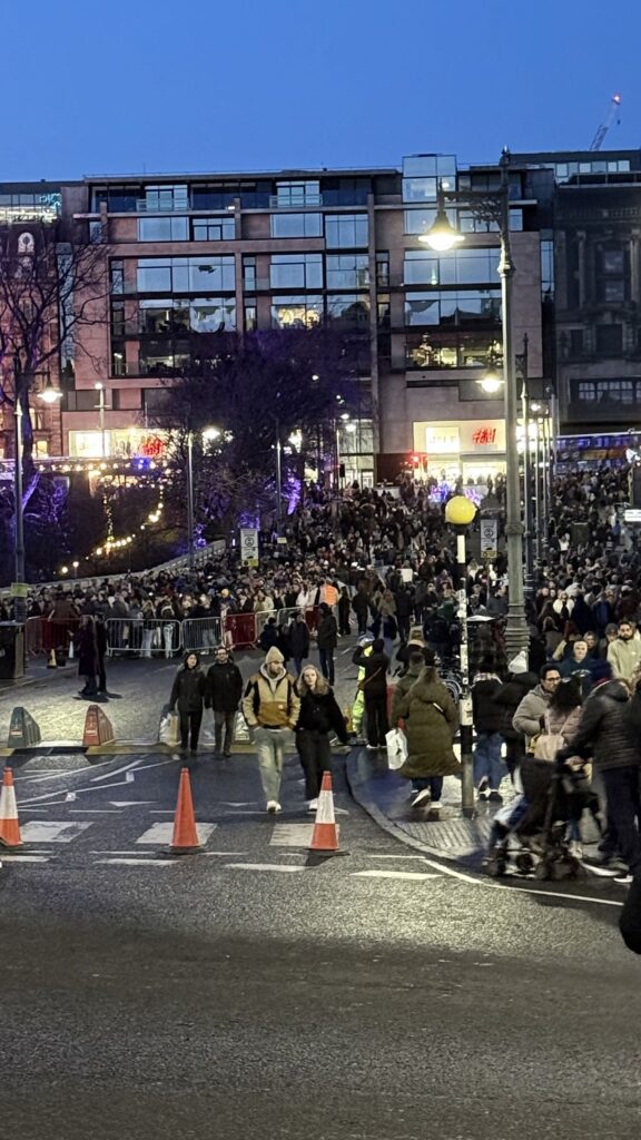 Prince Street crowded with people.