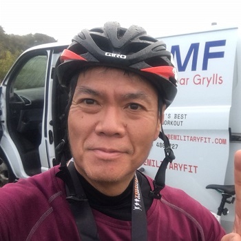 Richard Chin with cycling helmet on