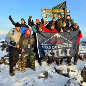 The group was triumphant after conqured Kilimanjaro
