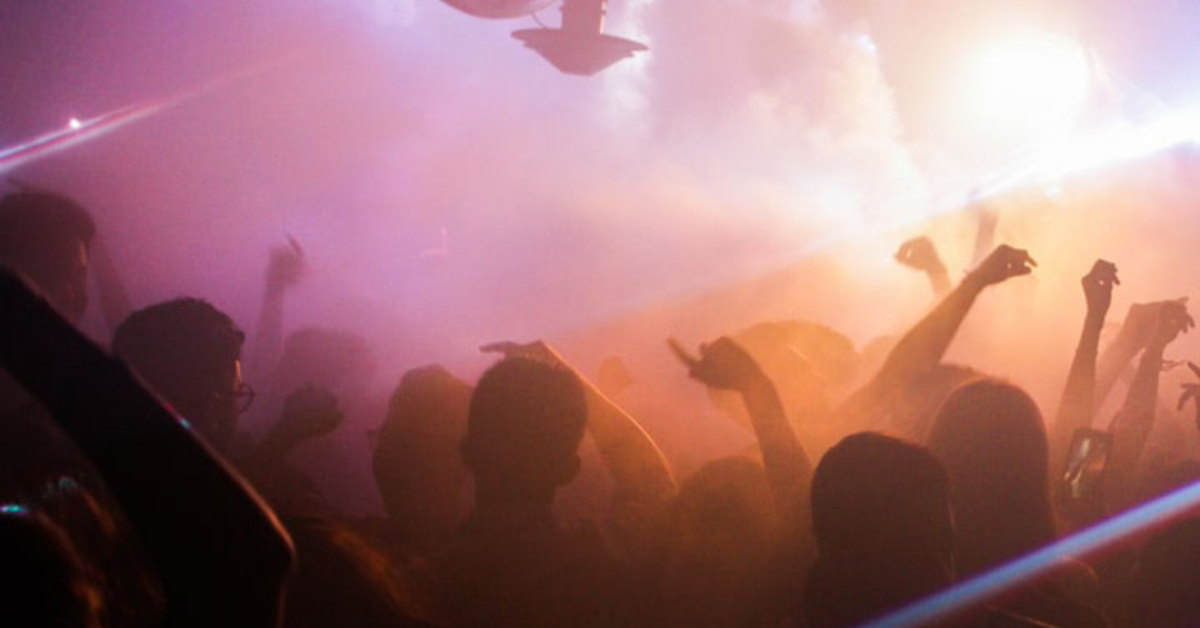 Party, arms in the air, loud music