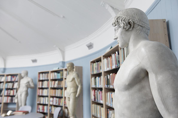 Statues and bookcases in the Student Research Rooms