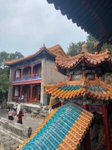 The old Summer Palace. A traiditional Chinese building with vivid orange and turquoise roof tiles.