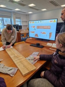 Staff and Students making bat boxes on campus