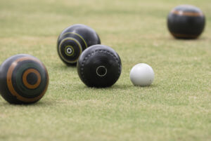 A photograph of contemporary lawn bowls