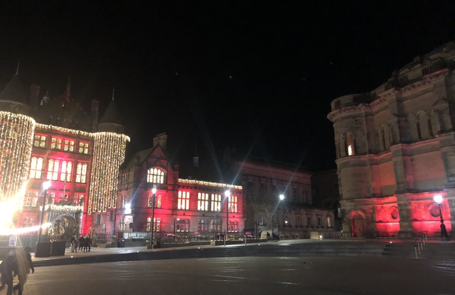 Teviot Row House and McEwan Hall lit up in red