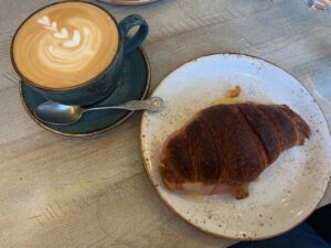 Flat white and croissant