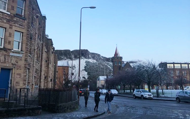 View of Arthur's Seat in the distance with snow