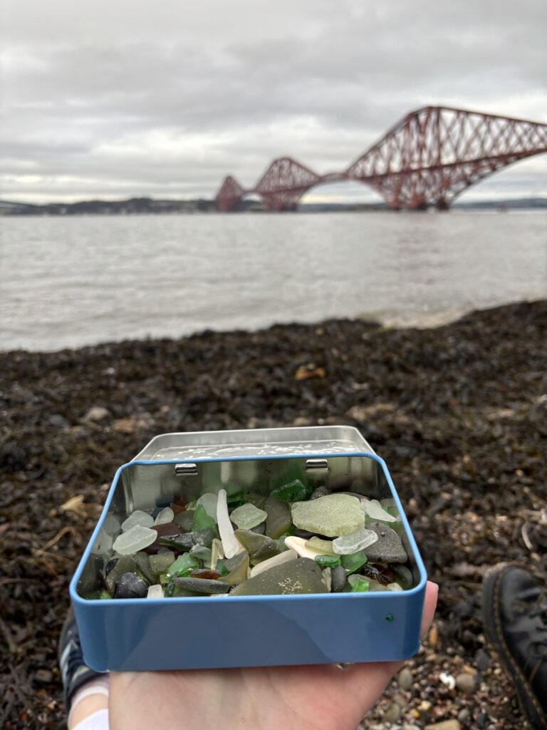 A tin of sea glass on Queensferry beach