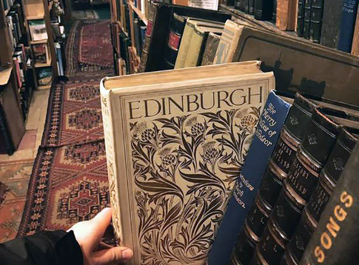An old book of Edinburgh inside a book shop