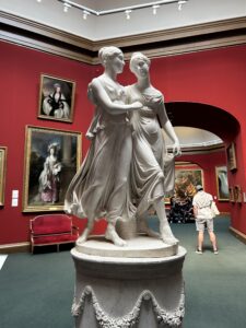 A statue in a gallery.