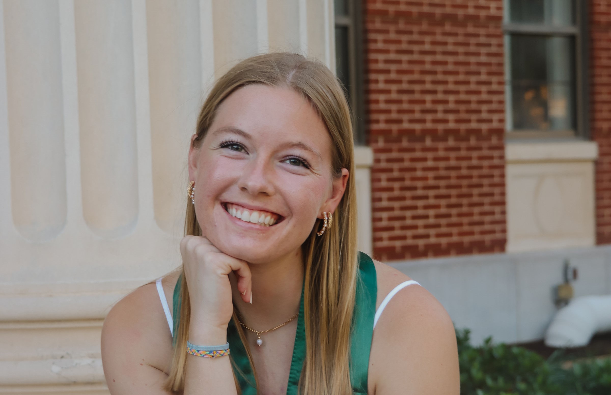 Lydia smiling for a portrait