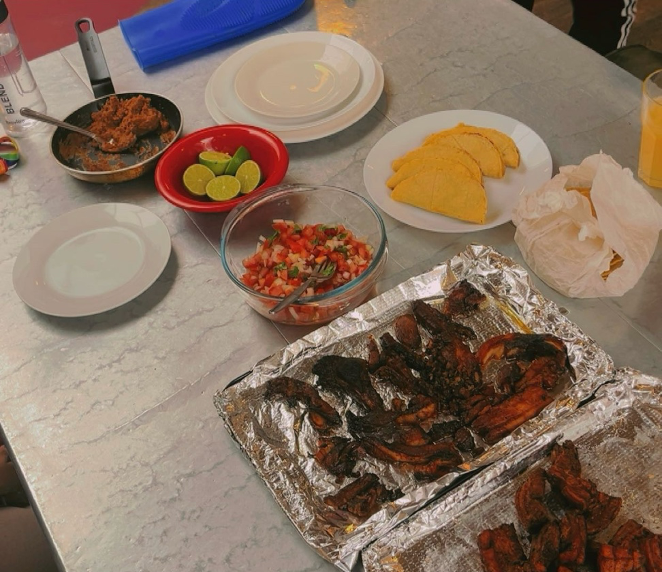 Homemade pork belly tacos, spicy slaw and tortillas.