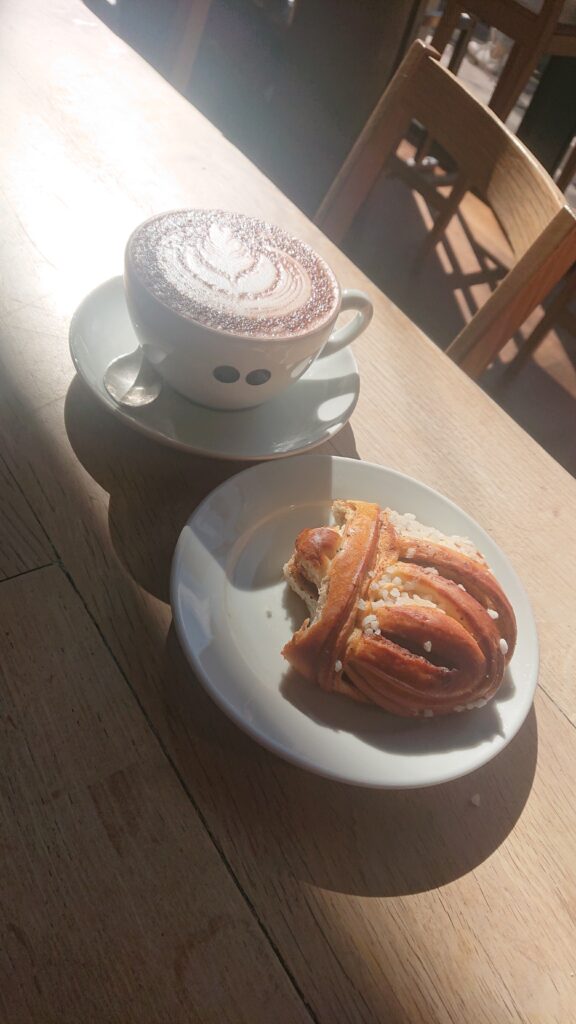 A coffee and a pastry