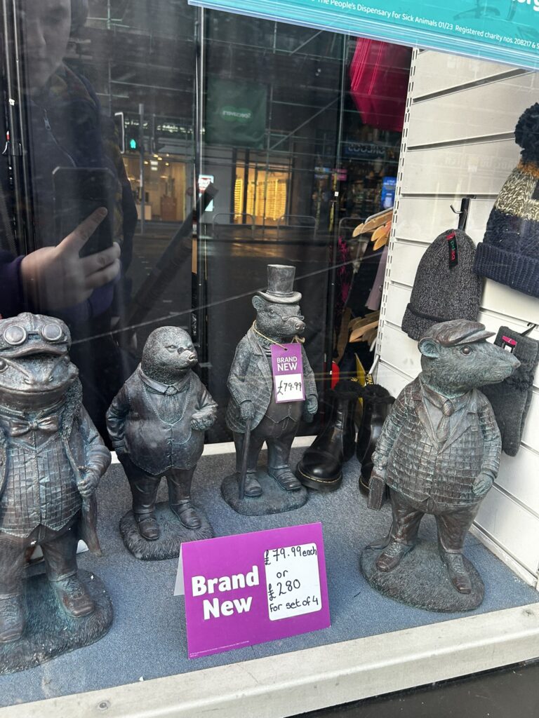 Some figurines in a charity shop