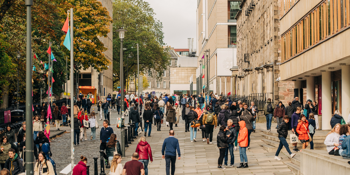 People walking around George Square during an Open Day.