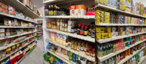Various aisles full of food and drink within Starlight supermarket.