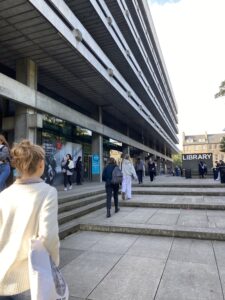 Students walking towards the main library at George Square, Edinburgh.
