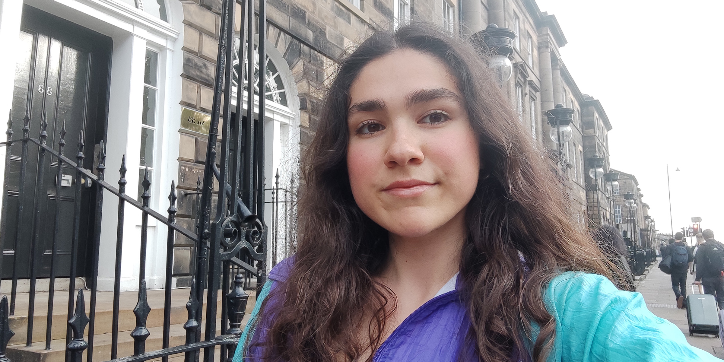 Selfie of student Aleksandra walking along an Edinburgh street.