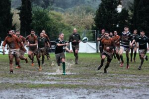 Rugby players in the rain