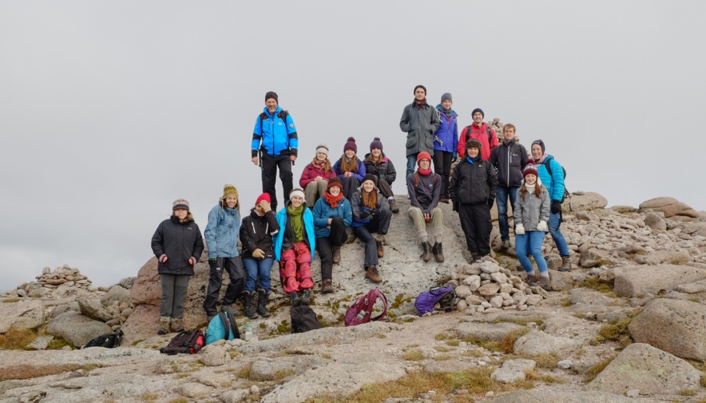 Photograph of students on a mountain top