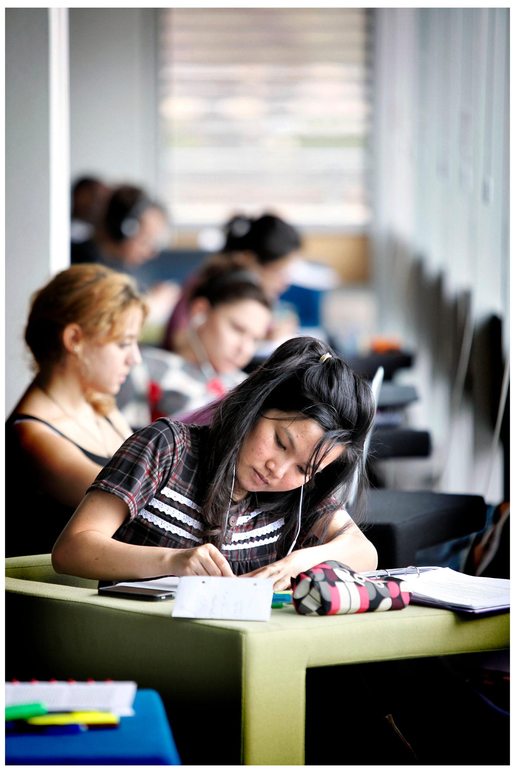 student in library