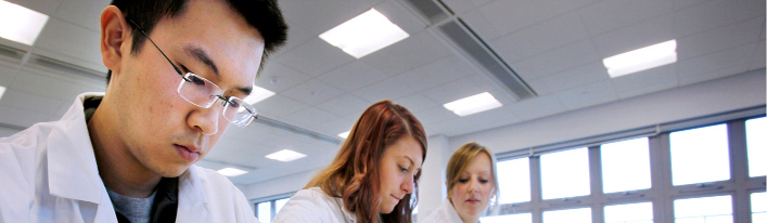 students suturing in a lab