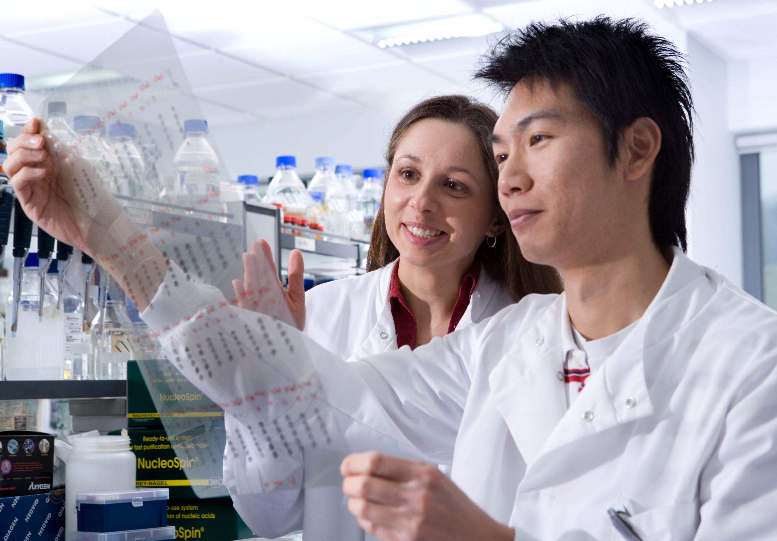 Two students in a biology lab