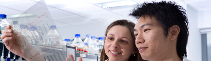 Two students in a biology lab