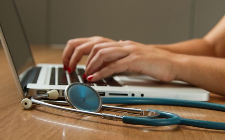 Stethoscope and Laptop Computer