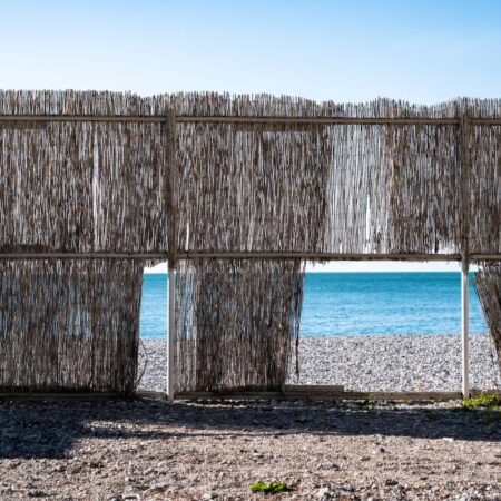 barrier with sea in the background, decorative image to evoke the idea of barriers breaking down