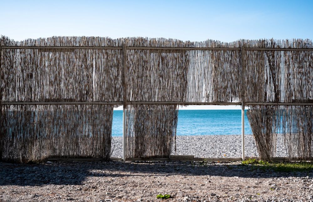 barrier with sea in the background, decorative image to evoke the idea of barriers breaking down