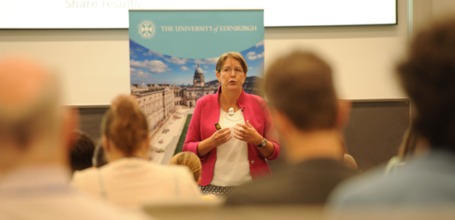 Photograph of the author and key note speaker Irma Meijerman speaking at the Learning and Teaching conference to the audience