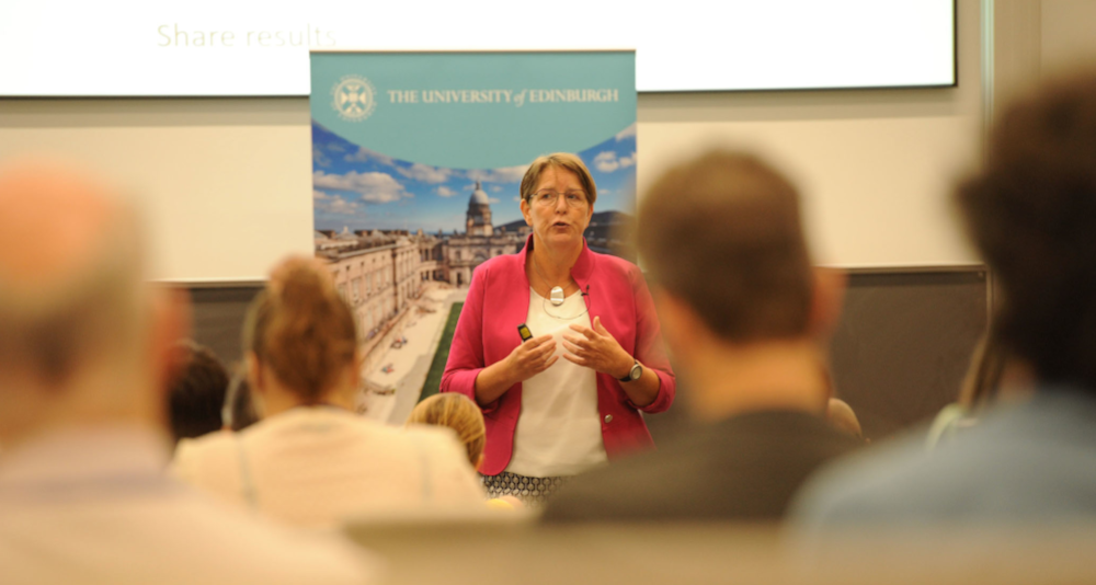 Photograph of the author and key note speaker Irma Meijerman speaking at the Learning and Teaching conference to the audience