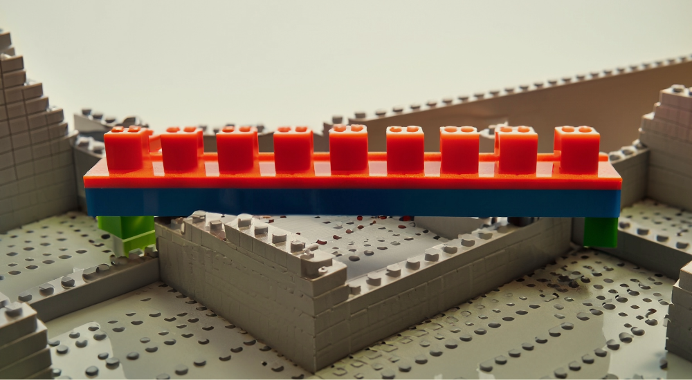 AI generated image [BETA]: LEGO bridge over a developing LEGO landscape