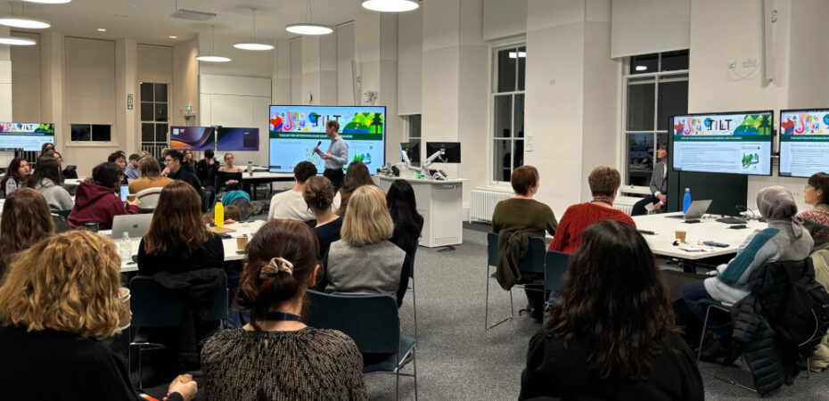 Photo of David presenting the TILT launch at Edinburgh Futures Institute to room of students and staff