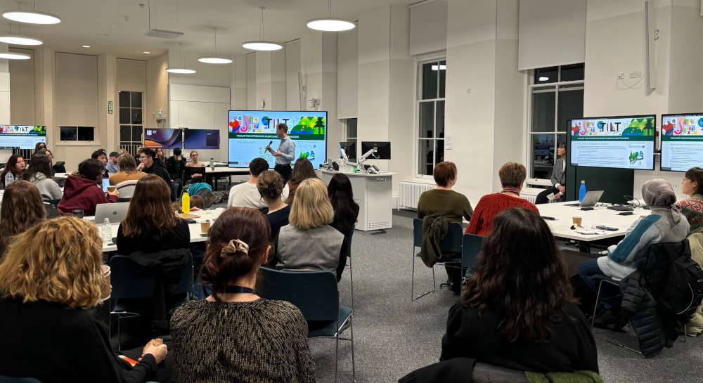 Photo of David presenting the TILT launch at Edinburgh Futures Institute to room of students and staff