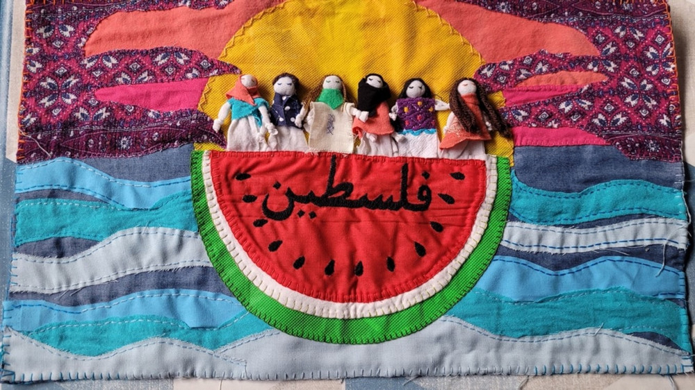 An arpillera - a Chilean embroidered textile.