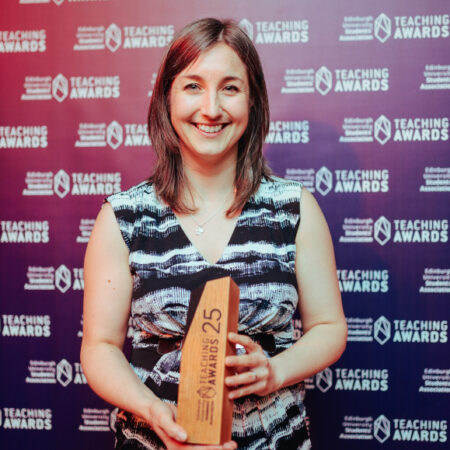 Photo of Claire accepting her Teaching Award