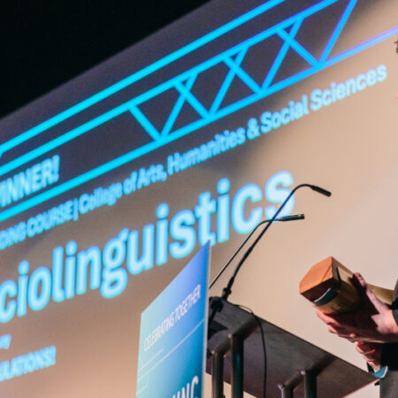 Photo of Christian receiving his Teaching Award