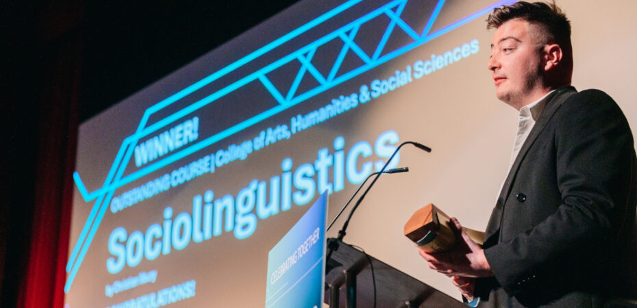 Photo of Christian receiving his Teaching Award
