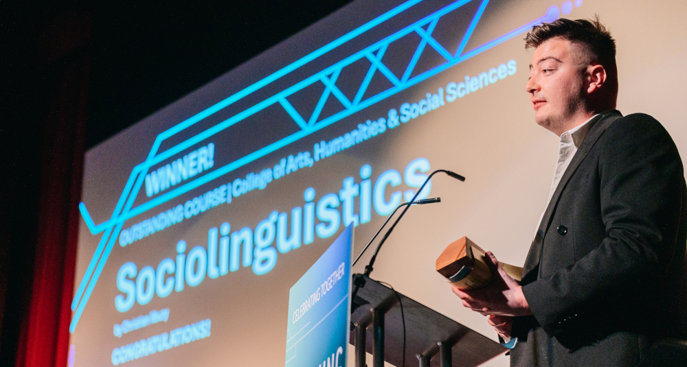 Photo of Christian receiving his Teaching Award
