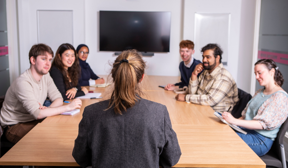 students sitting around desks