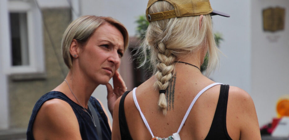 Photo of two woman talking