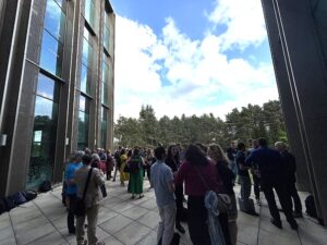 Photo of delegates on first-floor balcony at drinks reception