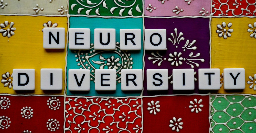scrabble letters spelling out 'neuro diversity'